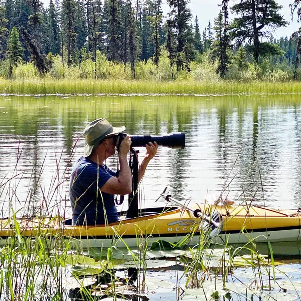 kayak and zoom lens