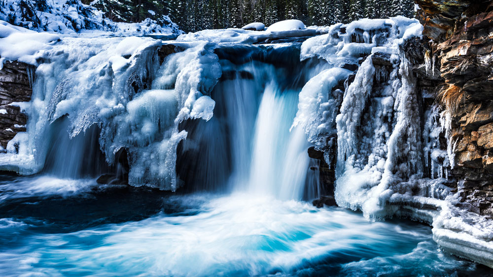 a frozen sheep river falls