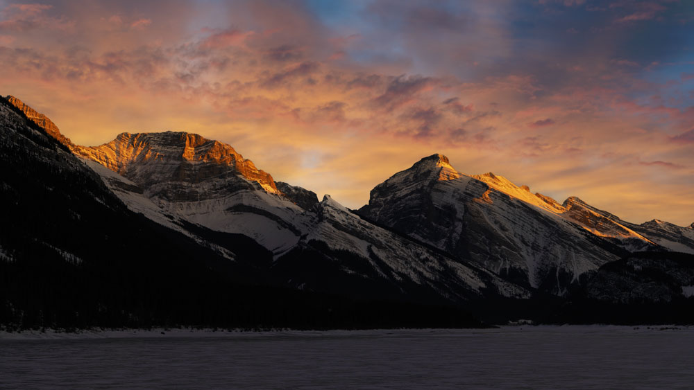 spray mountains sunset