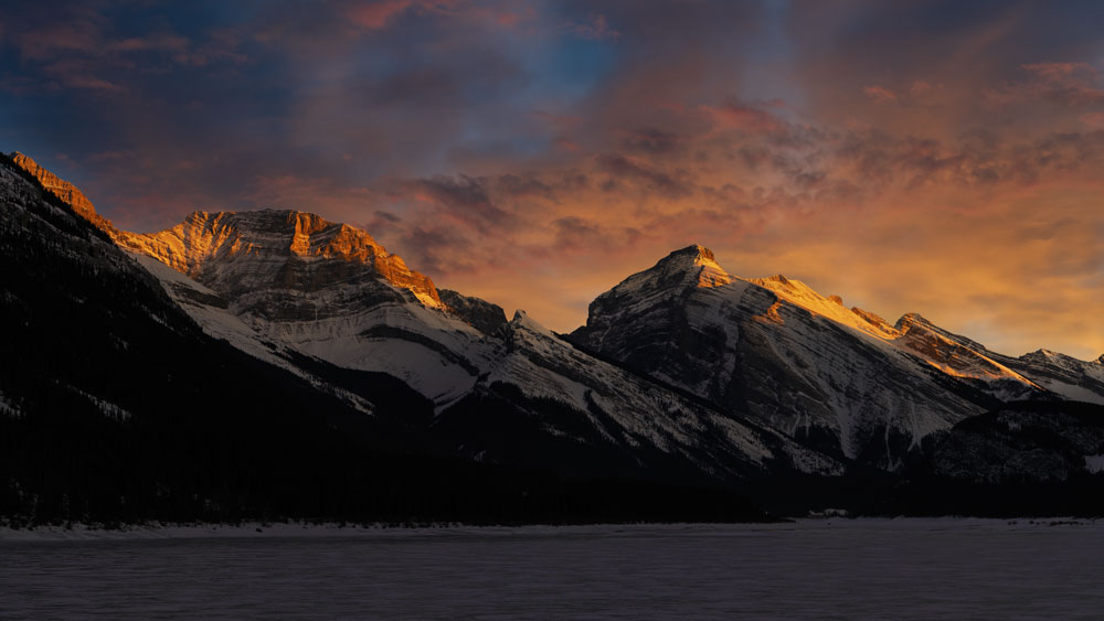 setting sun on mountains, spray lake Alberta