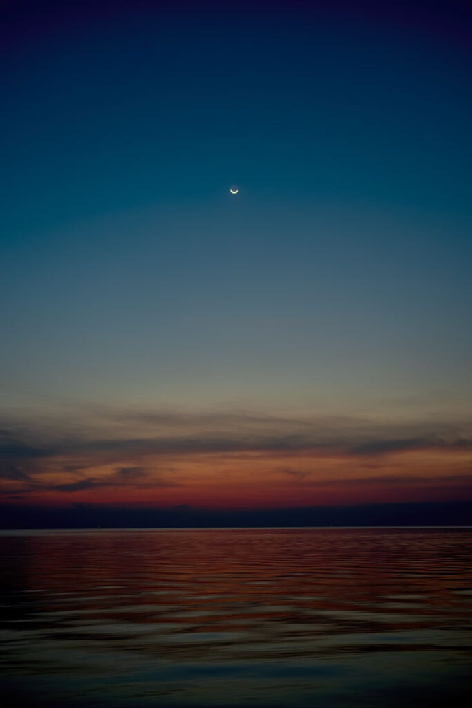 moon set over gulf of thailand shot from vietnam