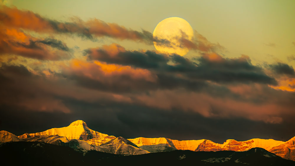 Moon setting over the rockies